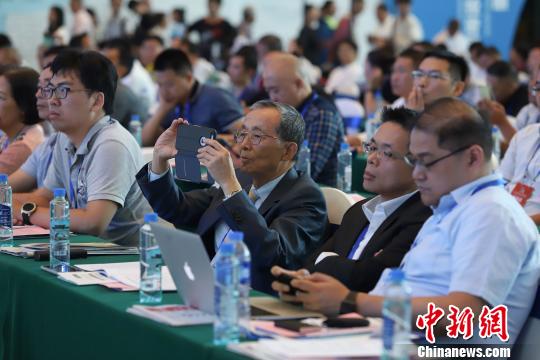 研討會現(xiàn)場圖?！■暮陚?攝